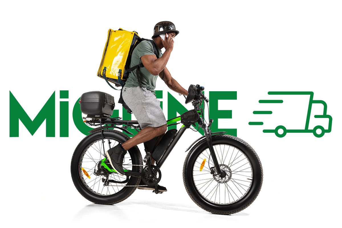 Too much orders. Contacless delivery service during quarantine. Man delivers food during isolation, wearing helmet and face mask. Taking food on bike isolated on white background. Safety. Hurrying up.